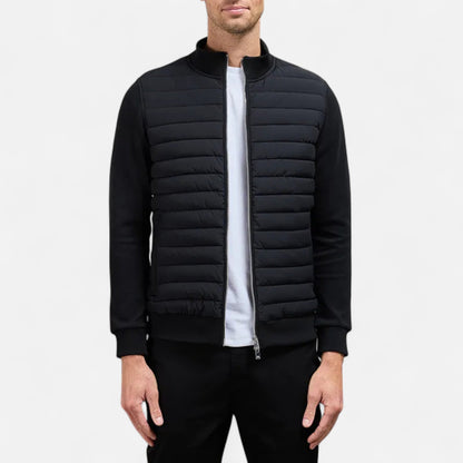 Men's lightweight winter jacket featuring a high collar. The jacket is designed for cold weather, showcasing a streamlined fit and practical zip-up front. 0