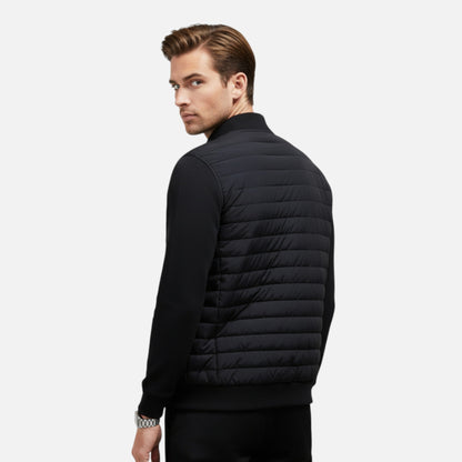Men's lightweight winter jacket featuring a high collar. The jacket is designed for cold weather, showcasing a streamlined fit and practical zip-up front. 2