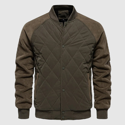 Men's quilted bomber jacket featuring elastic cuffs and a sporty design. 1