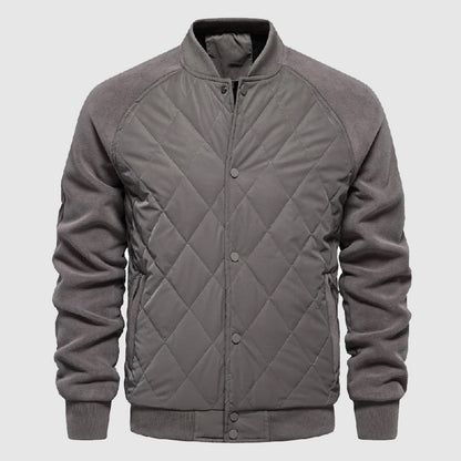 Men's quilted bomber jacket featuring elastic cuffs and a sporty design. 2