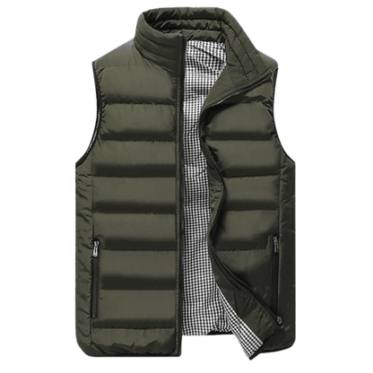 Men's quilted sleeveless vest with a modern cut, featuring a front zipper and side pockets. The vest is displayed on a neutral background, showcasing 2