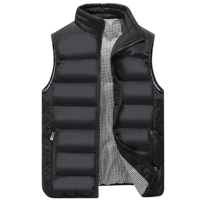 Men's quilted sleeveless vest with a modern cut, featuring a front zipper and side pockets. The vest is displayed on a neutral background, showcasing 3