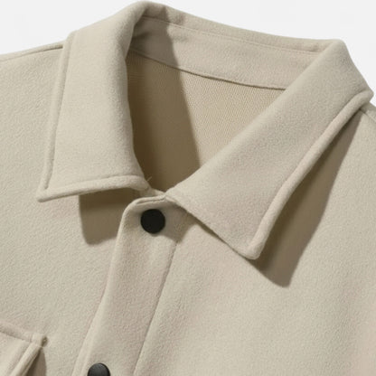 Men's tweed blazer in a classic style, featuring a tailored fit, notched lapels, and two front pockets. 3