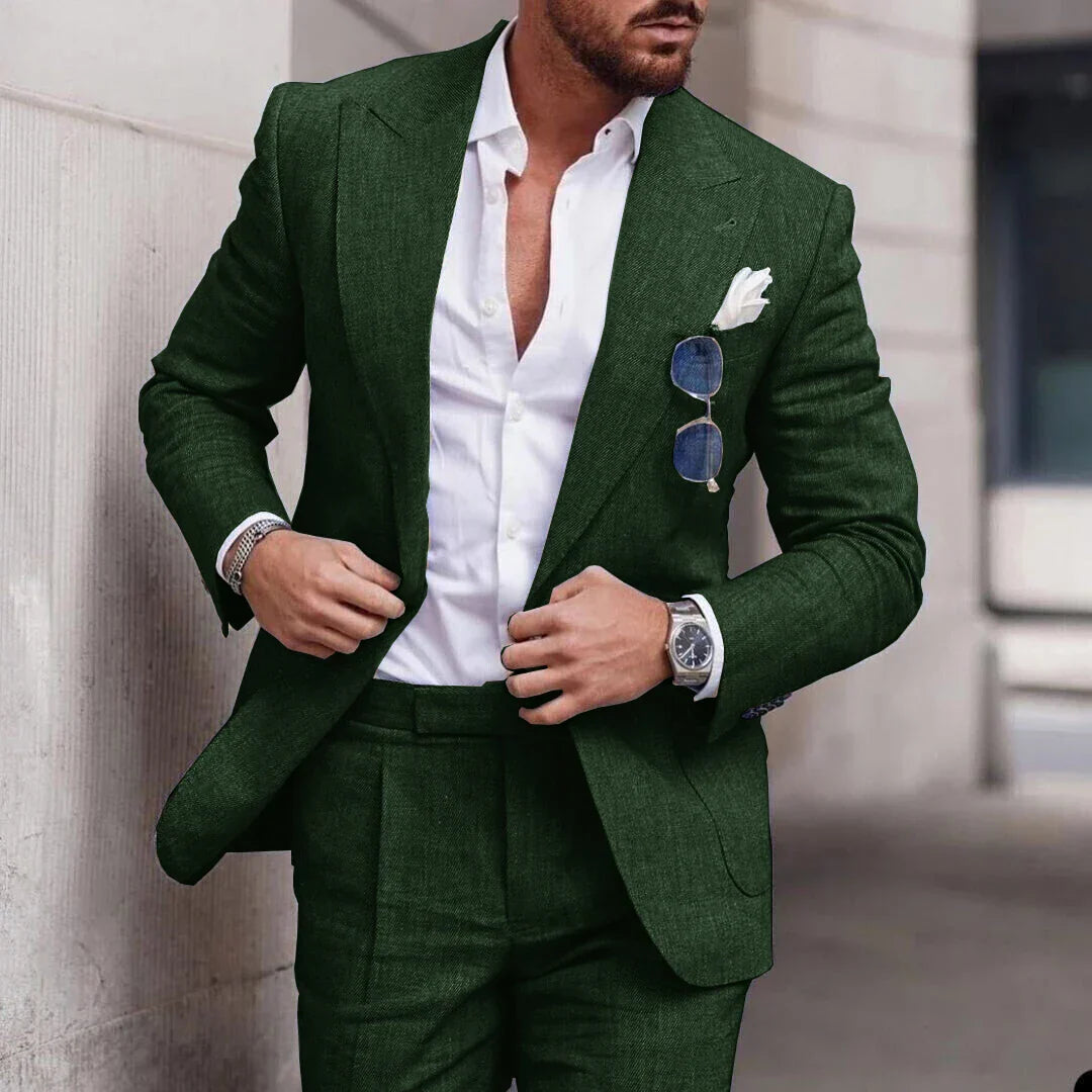 Men's two-piece wedding suit featuring a single-breasted jacket with open lapels and tailored trousers. 1