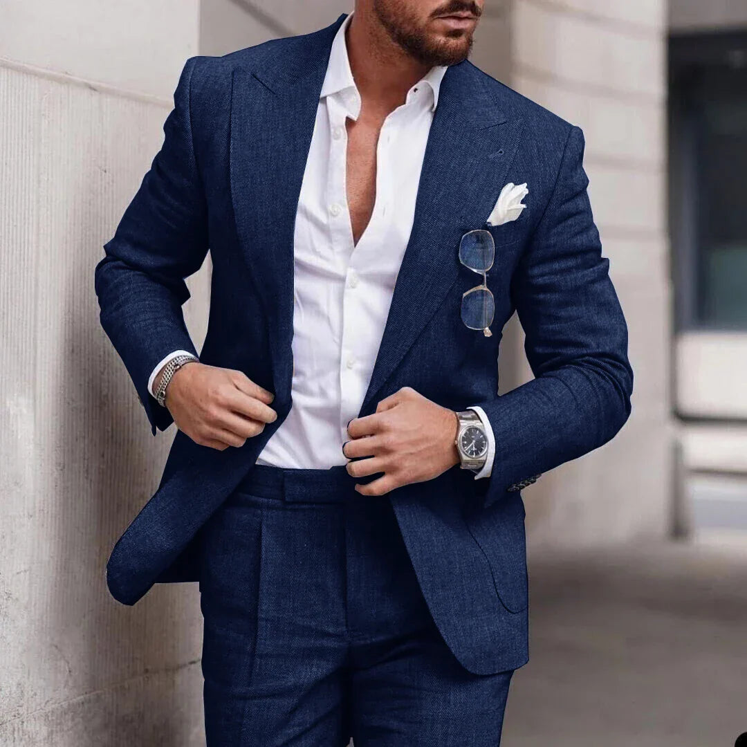 Men's two-piece wedding suit featuring a single-breasted jacket with open lapels and tailored trousers. 2