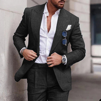 Men's two-piece wedding suit featuring a single-breasted jacket with open lapels and tailored trousers. 4