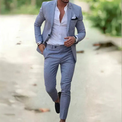 Men's classic black wedding suit with a tailored fit, featuring a jacket with notched lapels and matching trousers. 1