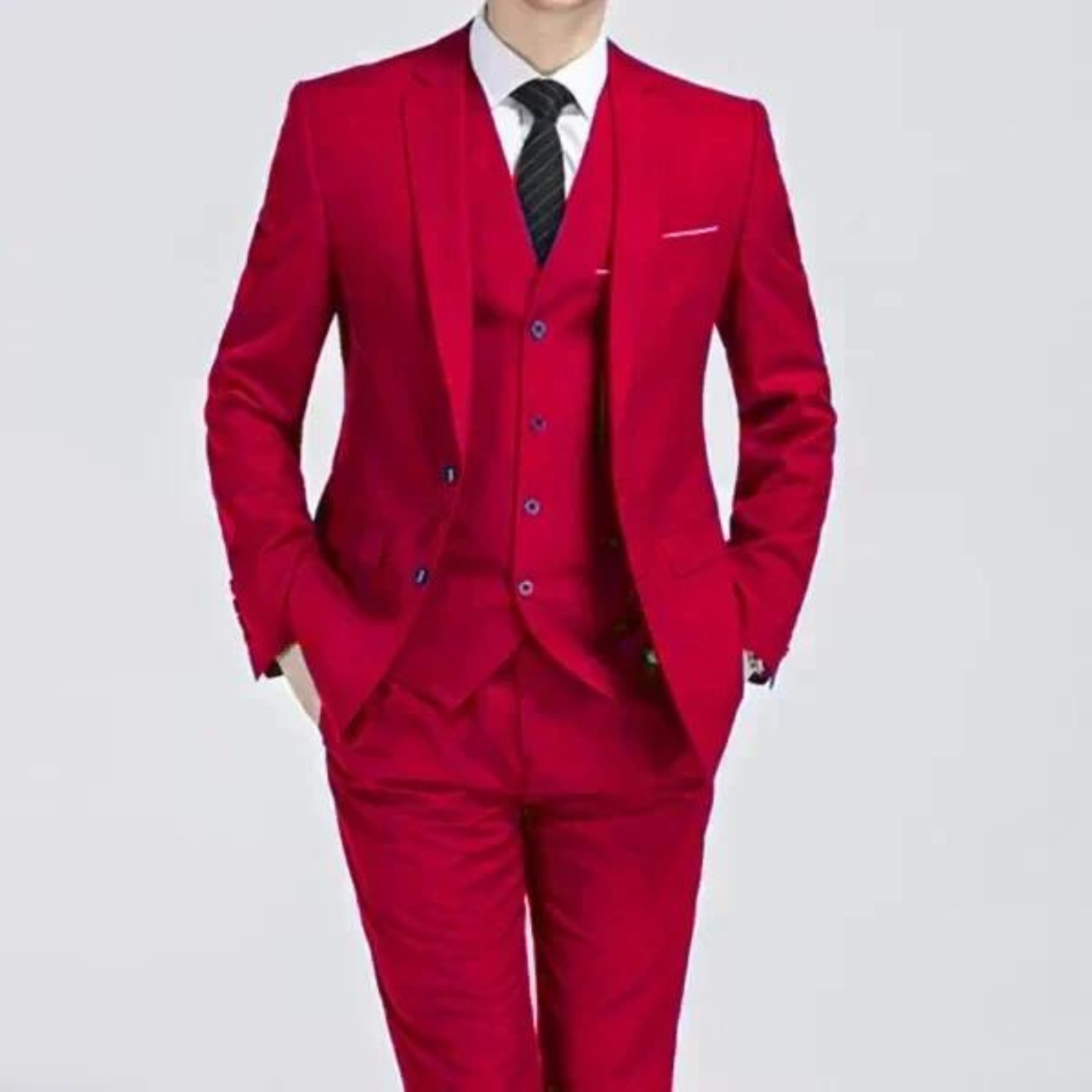 Men's classic three-piece suit displayed on a hanger, featuring a tailored jacket, matching vest, and trousers, arranged neatly for a spring presentation. 6