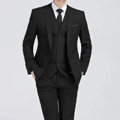 Men's classic three-piece suit displayed on a hanger, featuring a tailored jacket, matching vest, and trousers, arranged neatly for a spring presentation. 7