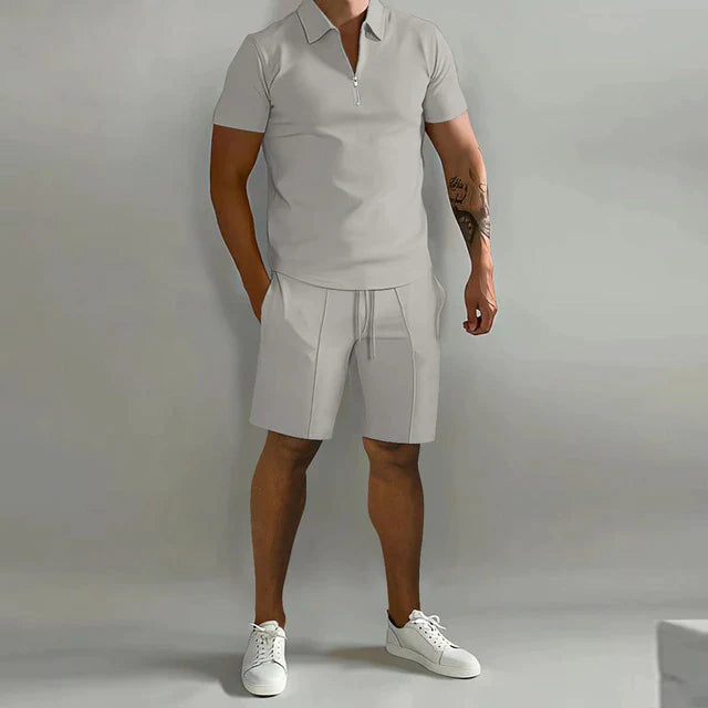 Men's summer polo and shorts set featuring a polished design, displayed on a neutral background. The polo shirt has a classic collar and button placket, 1