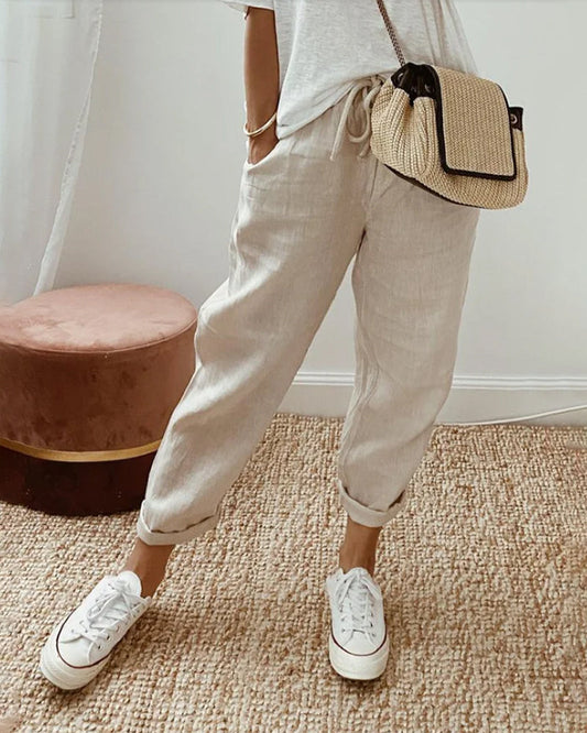 Men's casual long pants with pockets in a regular fit, displayed on a flat surface. 0