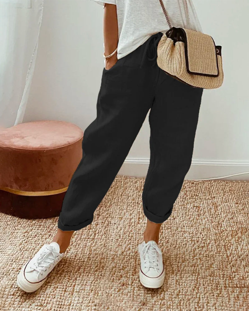 Men's casual long pants with pockets in a regular fit, displayed on a flat surface. 1