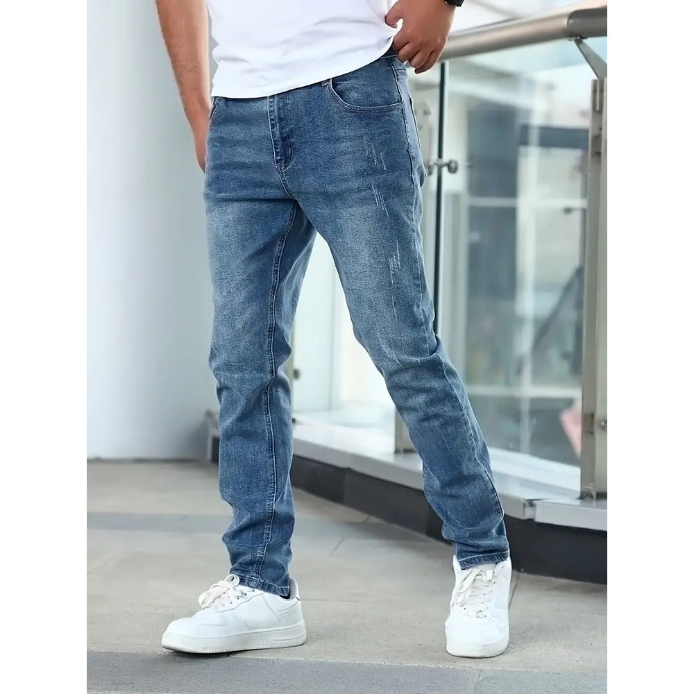 Men's casual jeans featuring pockets and a slightly distressed appearance. 1