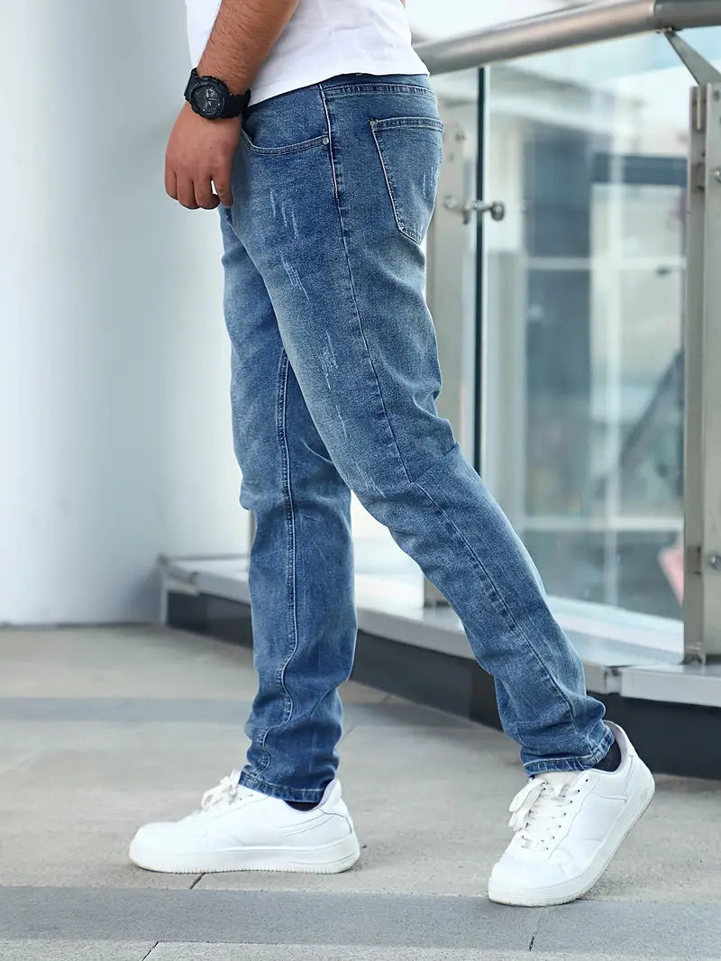 Men's casual jeans featuring pockets and a slightly distressed appearance. 4