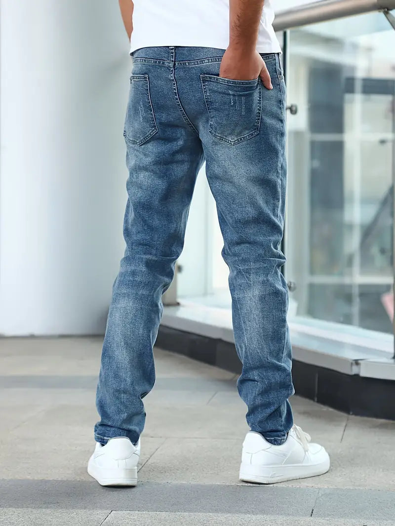 Men's casual jeans featuring pockets and a slightly distressed appearance. 5