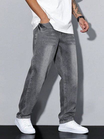 Men's loose-fitting jeans with straight legs in a solid color, displayed flat on a white background. 1