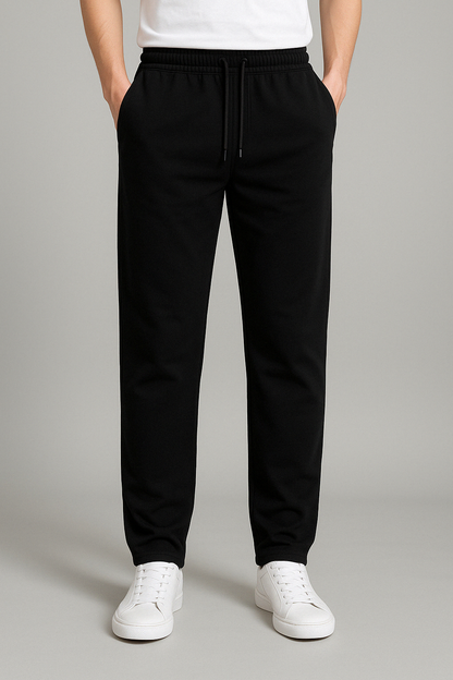 Men's sweatpants with wide legs and an elastic waistband, displayed on a neutral background. 0