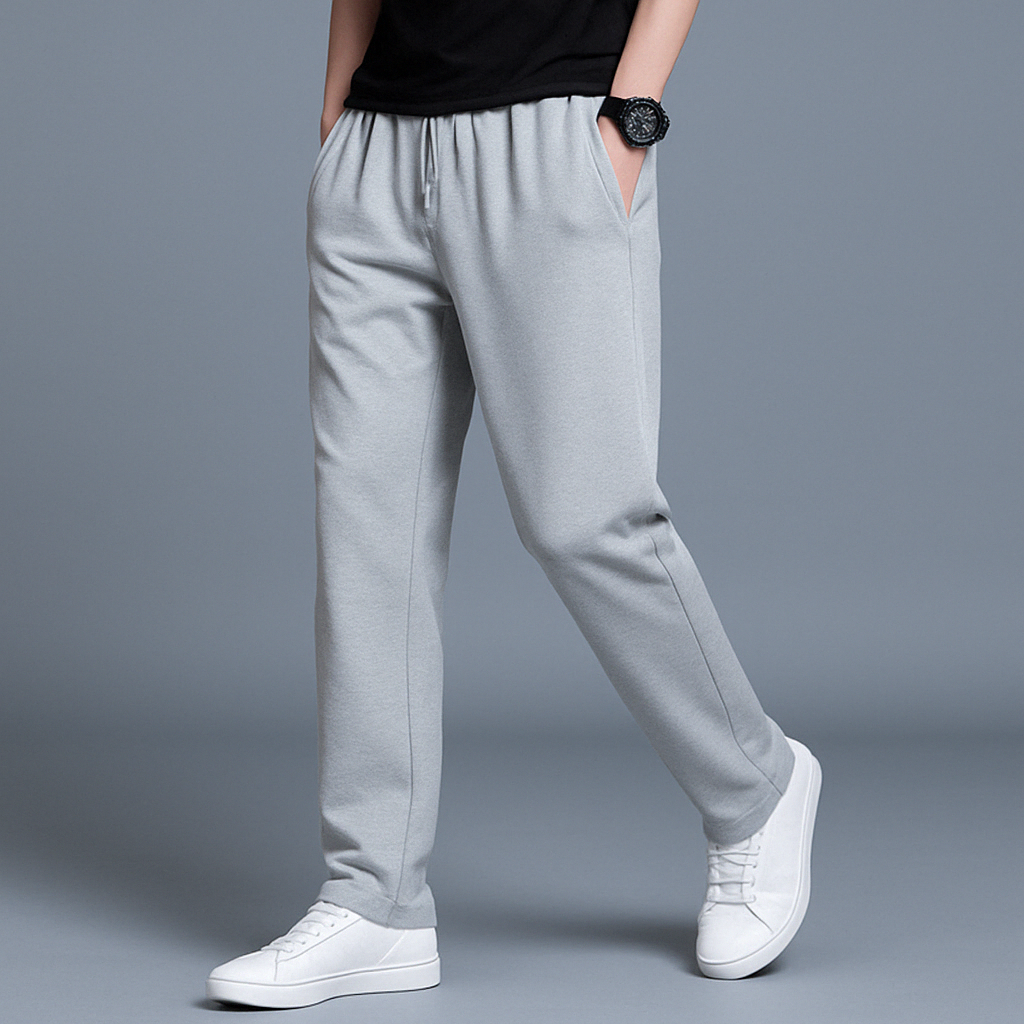Men's sweatpants with wide legs and an elastic waistband, displayed on a neutral background. 3
