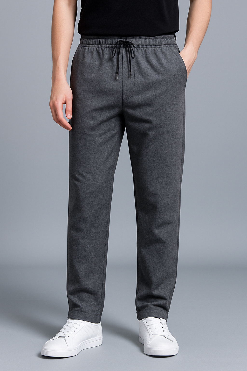 Men's sweatpants with wide legs and an elastic waistband, displayed on a neutral background. 5