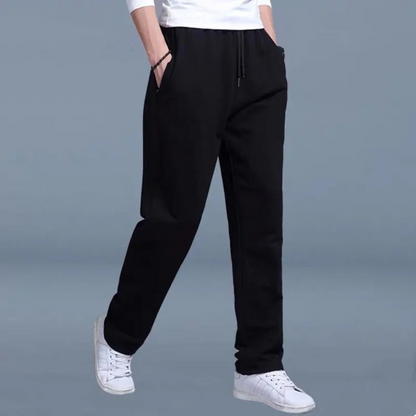 Men's sweatpants with wide legs and an elastic waistband, displayed on a neutral background. 8