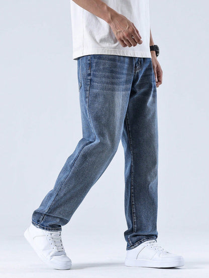 Men's casual straight-leg jeans with a distressed look. 1