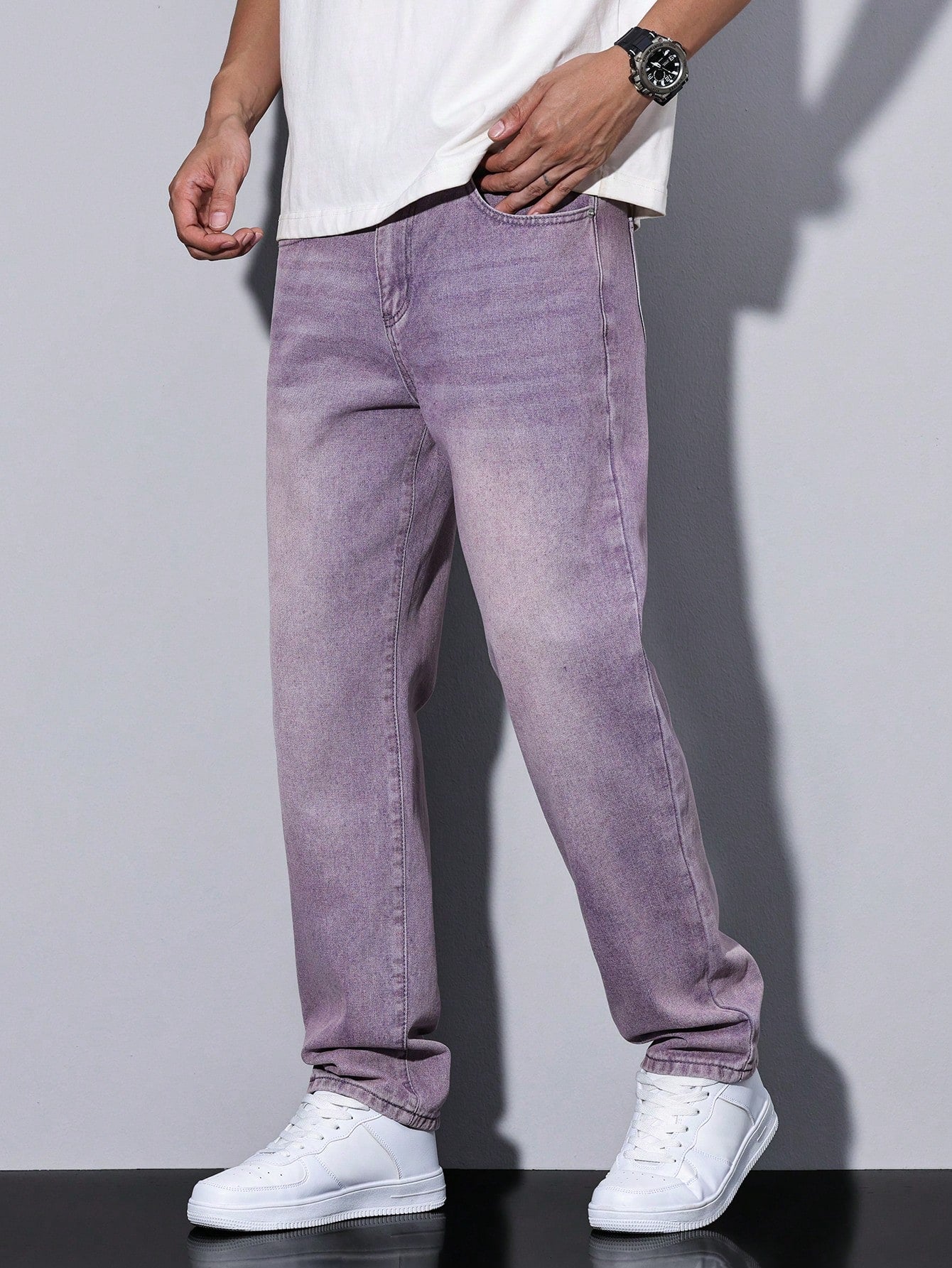 Men's casual straight-leg jeans with a distressed look. 3