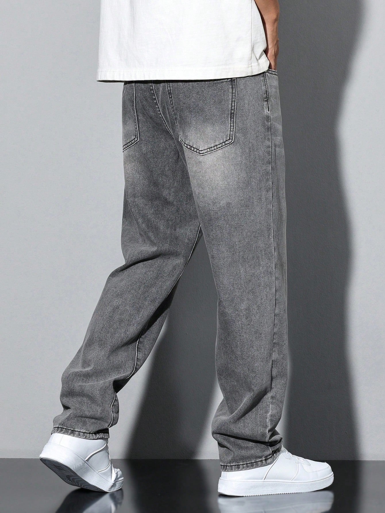 Men's casual straight-leg jeans with a distressed look. 6