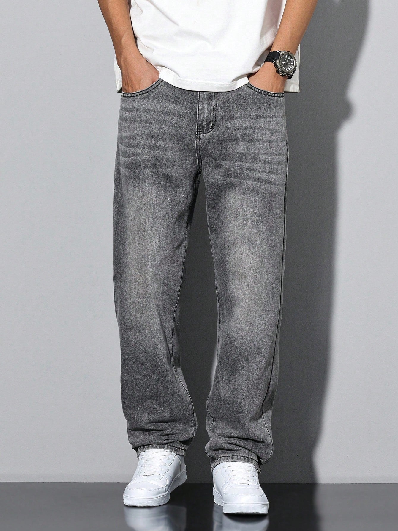 Men's casual straight-leg jeans with a distressed look. 8