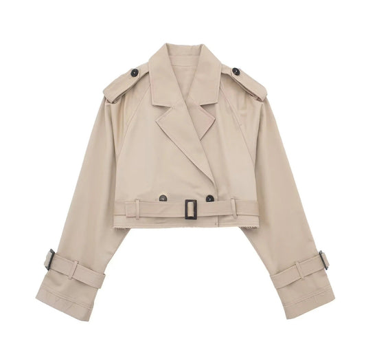 Short women's trench coat with a belt and double-breasted closure, displayed on a mannequin. 0