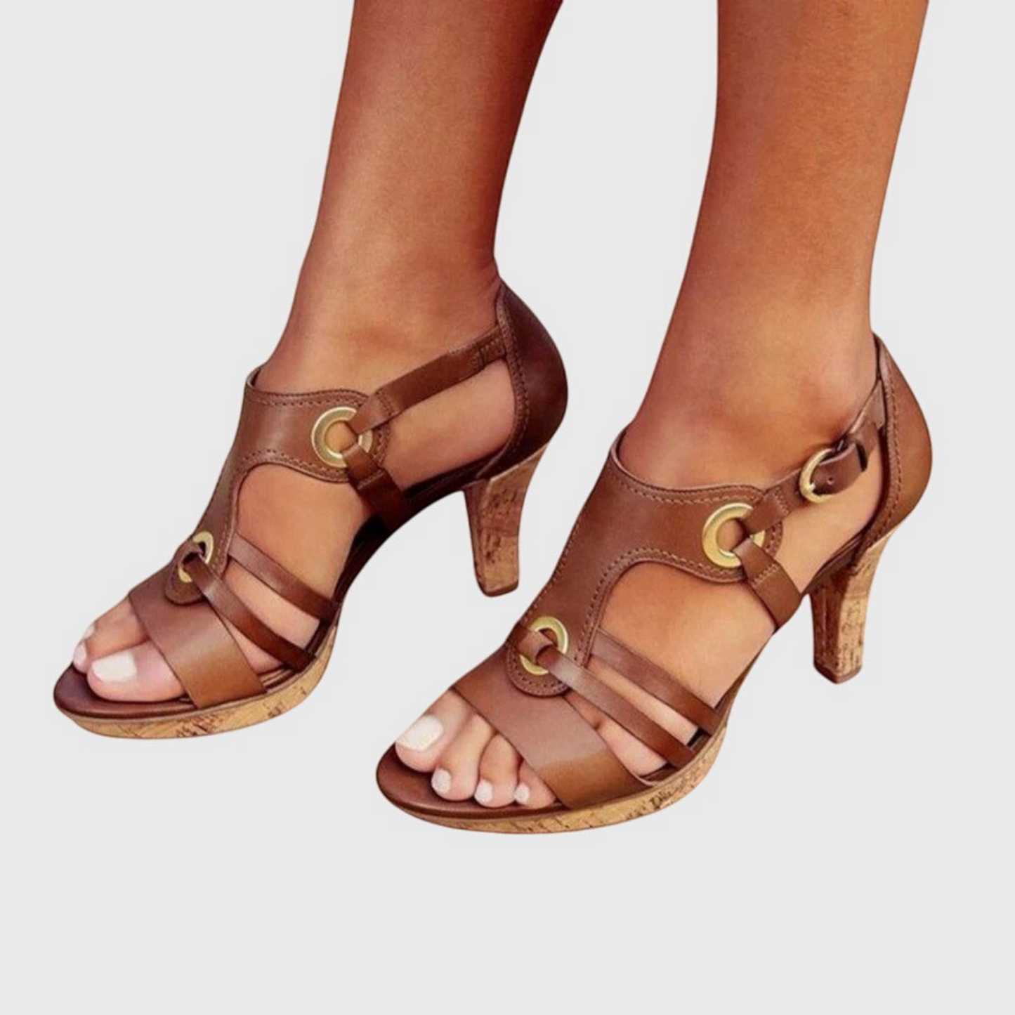 Women's heeled sandals featuring cut-out design and ventilated upper. 2