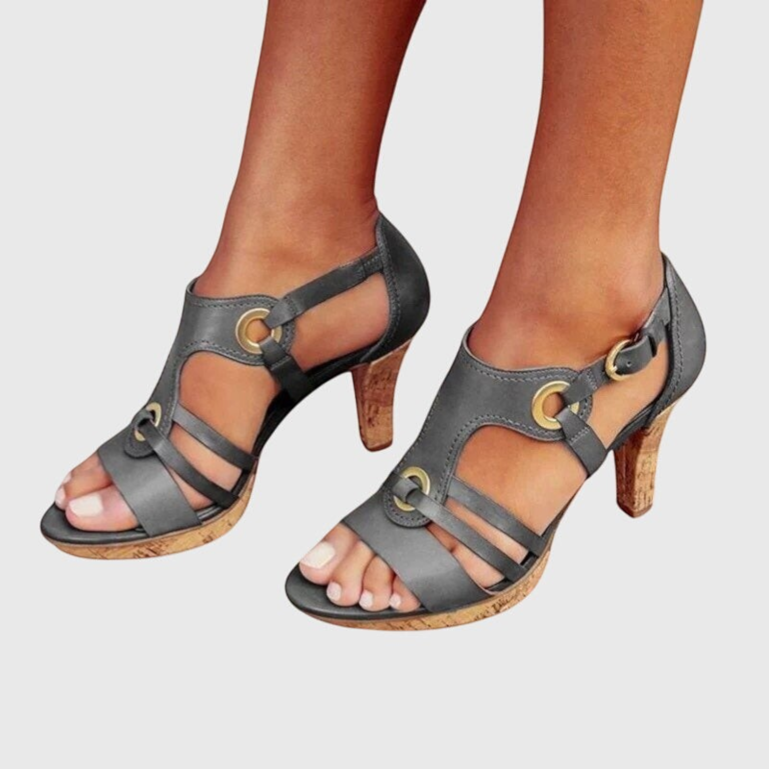 Women's heeled sandals featuring cut-out design and ventilated upper. 4