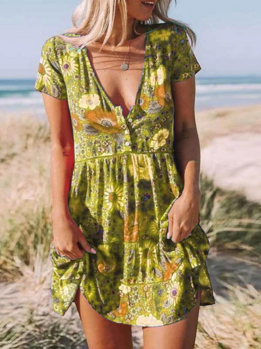A short-sleeve mini dress with a boho design, featuring a relaxed fit and a flowing silhouette, suitable for summer wear. 0