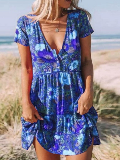 A short-sleeve mini dress with a boho design, featuring a relaxed fit and a flowing silhouette, suitable for summer wear. 4
