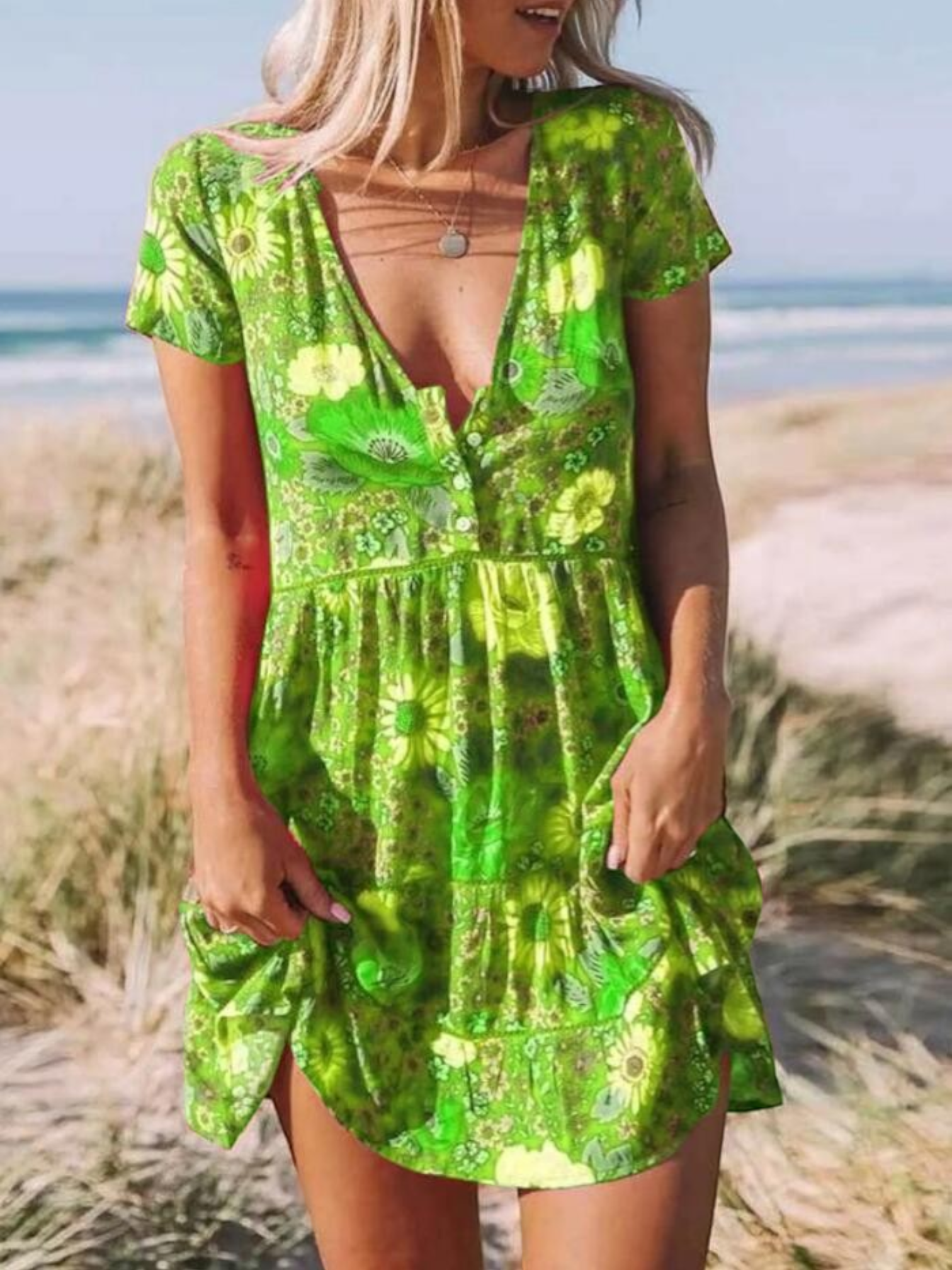 A short-sleeve mini dress with a boho design, featuring a relaxed fit and a flowing silhouette, suitable for summer wear. 5