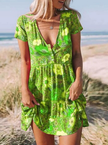 A short-sleeve mini dress with a boho design, featuring a relaxed fit and a flowing silhouette, suitable for summer wear. 5
