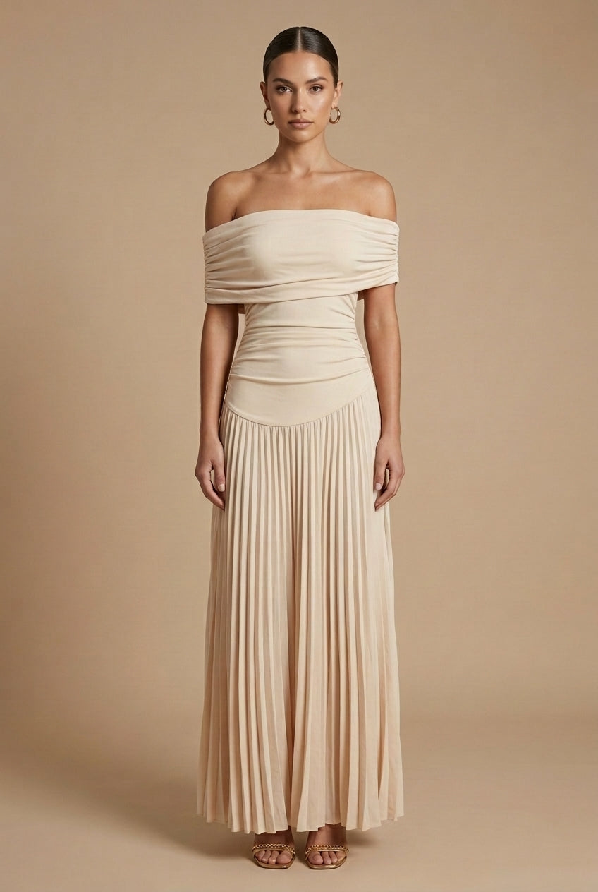Maxi dress for women featuring off-the-shoulder sleeves and a pleated skirt, displayed on a mannequin. 0