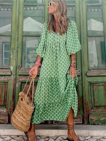 Maxi dress with long sleeves featuring a retro design, suitable for women attending weddings. The dress has a flowing silhouette and a classic pattern. 4