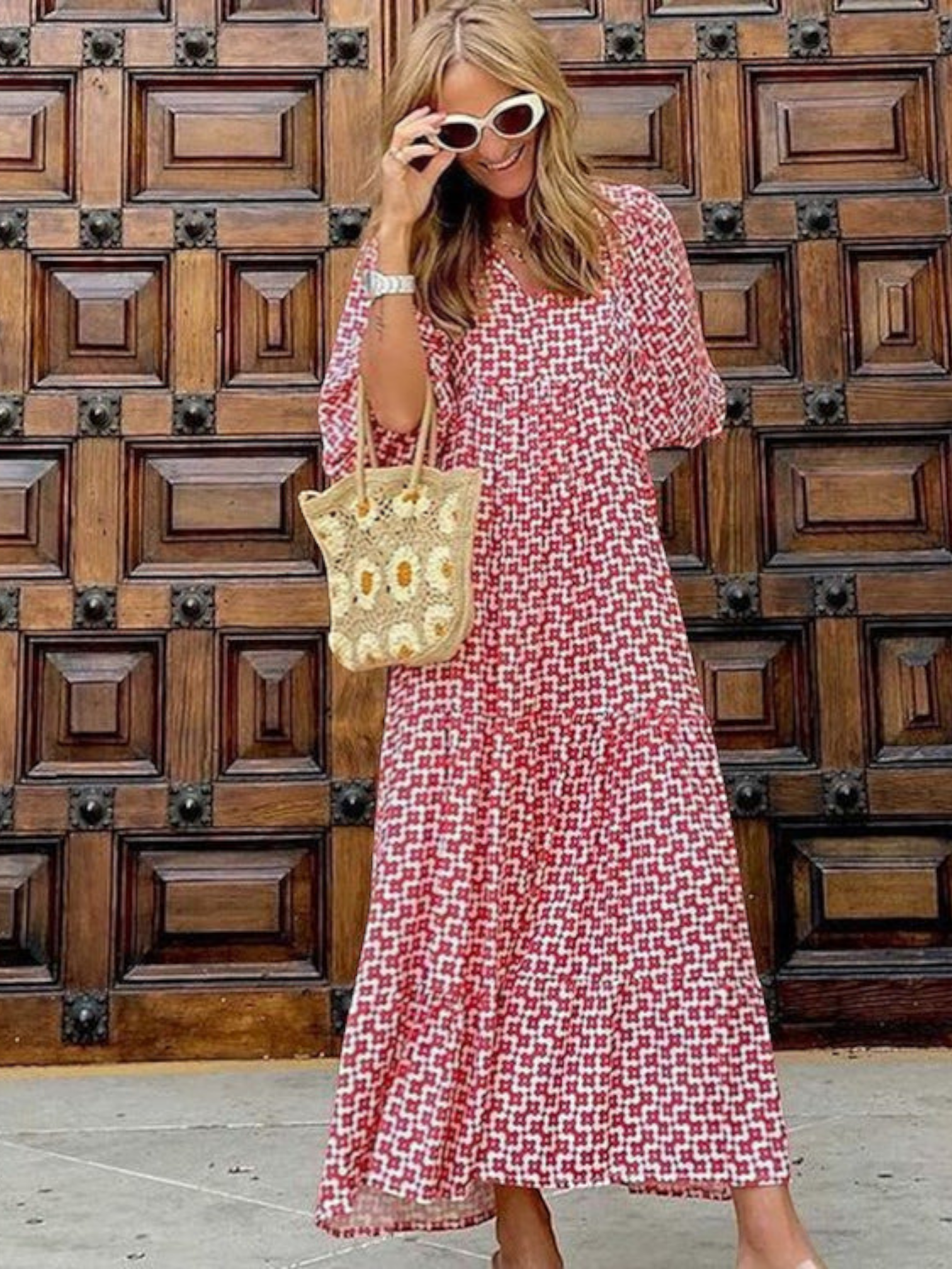 Maxi dress with long sleeves featuring a retro design, suitable for women attending weddings. The dress has a flowing silhouette and a classic pattern. 6