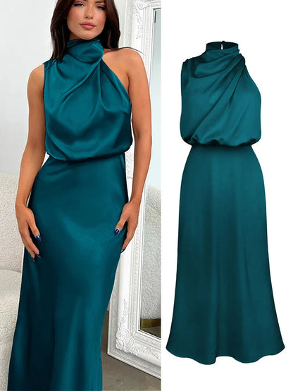 Elegant midi dress for women featuring an asymmetrical neckline. The dress has a fitted bodice and a flowing skirt that falls below the knee. 0