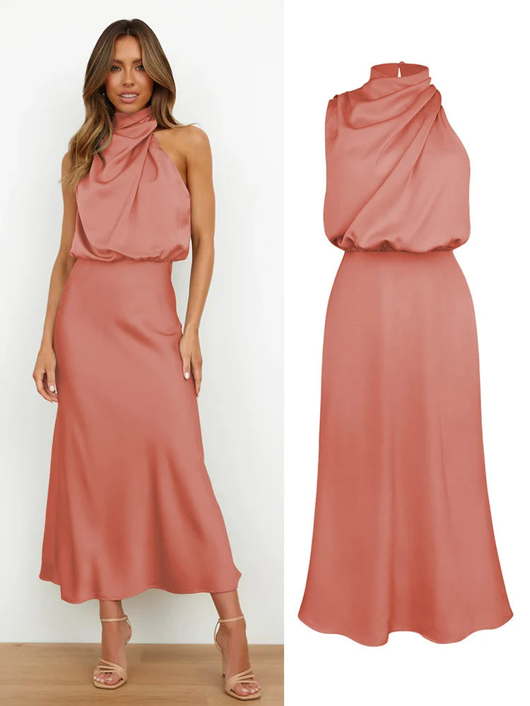 Elegant midi dress for women featuring an asymmetrical neckline. The dress has a fitted bodice and a flowing skirt that falls below the knee. 11