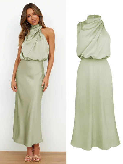 Elegant midi dress for women featuring an asymmetrical neckline. The dress has a fitted bodice and a flowing skirt that falls below the knee. 5