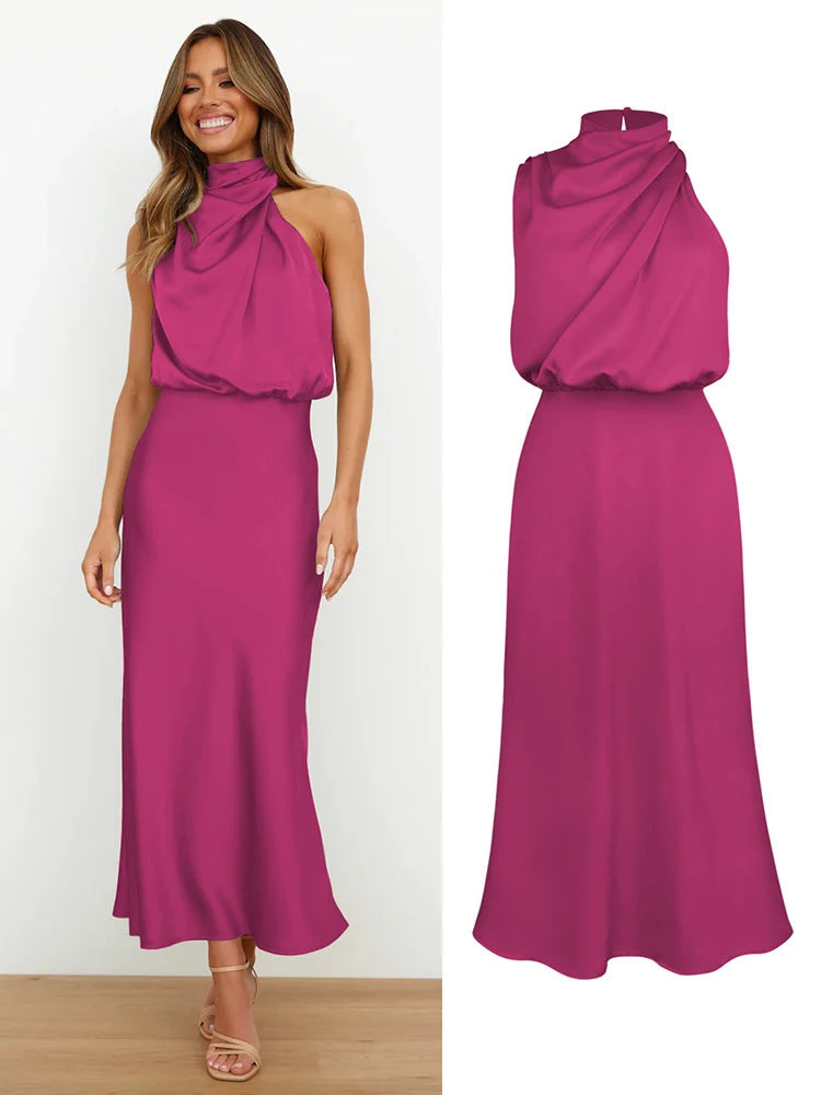 Elegant midi dress for women featuring an asymmetrical neckline. The dress has a fitted bodice and a flowing skirt that falls below the knee. 6