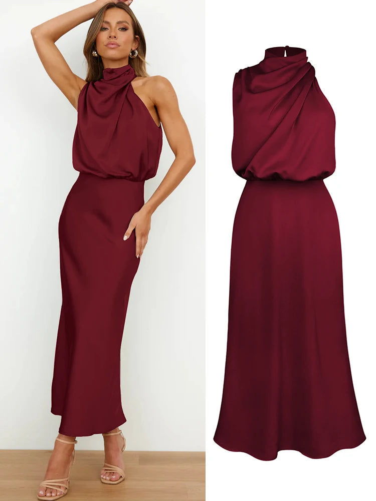 Elegant midi dress for women featuring an asymmetrical neckline. The dress has a fitted bodice and a flowing skirt that falls below the knee. 7