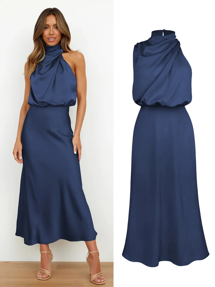 Elegant midi dress for women featuring an asymmetrical neckline. The dress has a fitted bodice and a flowing skirt that falls below the knee. 8