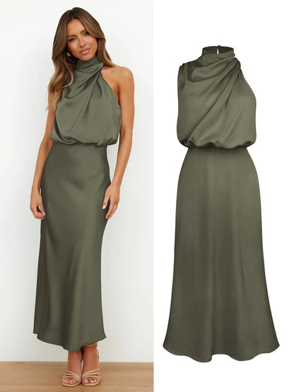 Elegant midi dress for women featuring an asymmetrical neckline. The dress has a fitted bodice and a flowing skirt that falls below the knee. 9