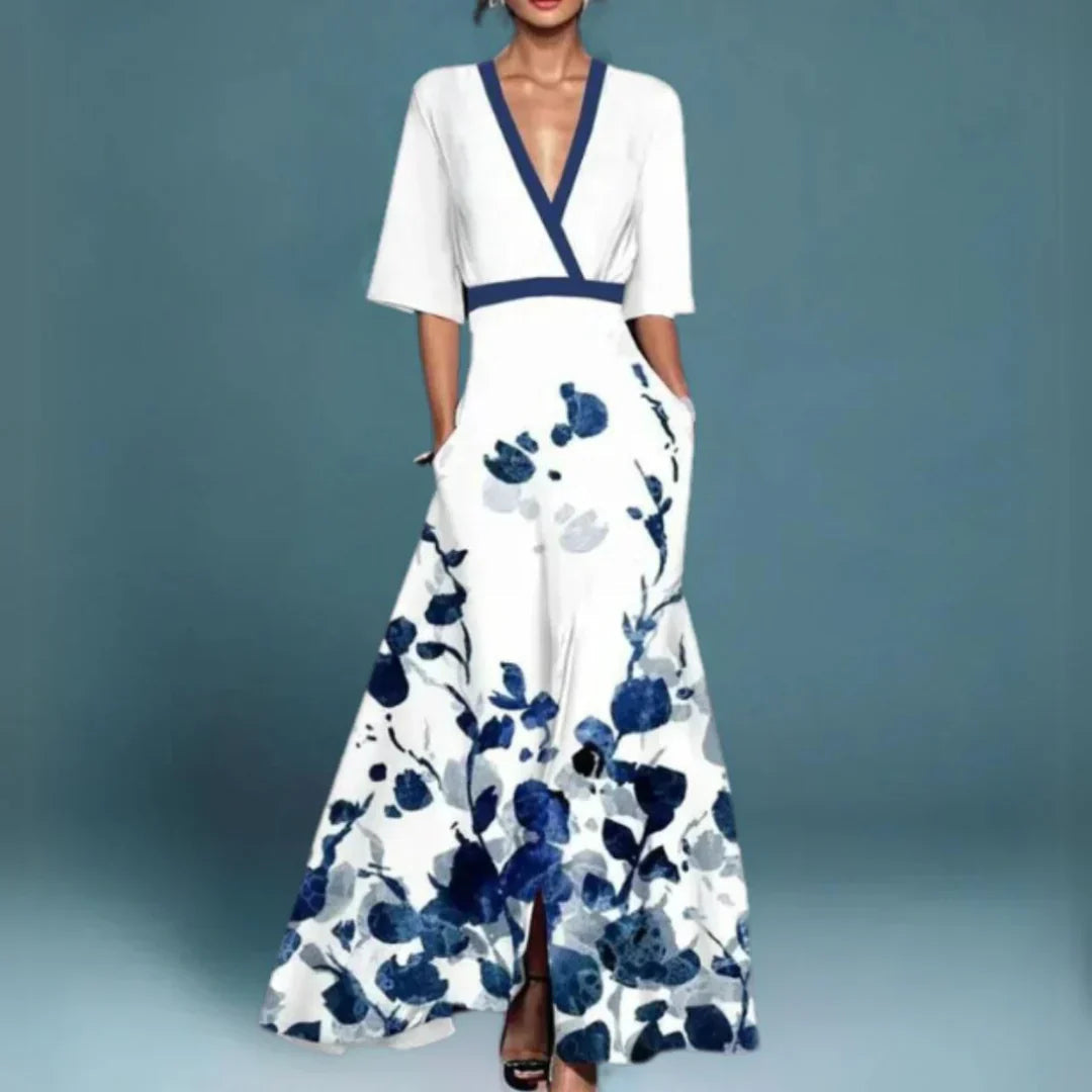Midi evening dress with a floral pattern and a loose fit, displayed on a mannequin against a neutral backdrop. 3