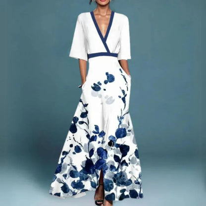 Midi evening dress with a floral pattern and a loose fit, displayed on a mannequin against a neutral backdrop. 3