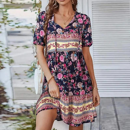 Women's midi dress featuring a V-neck design and a floral pattern, suitable for evening events and weddings. 1
