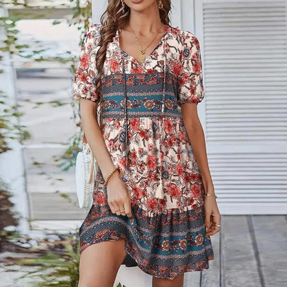 Women's midi dress featuring a V-neck design and a floral pattern, suitable for evening events and weddings. 4