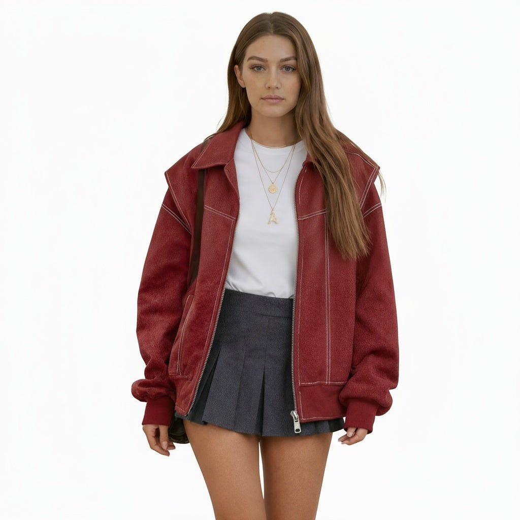 Women's oversized bomber jacket featuring contrast stitching details. 1